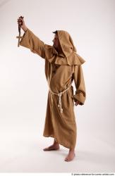 JOEL_ADAMSON MONK WITH CRUCIFIX